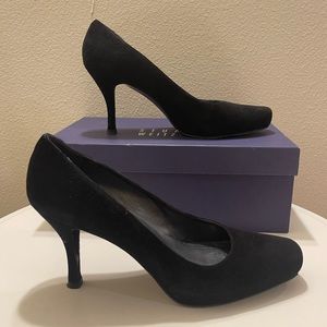 Elevate Every Occasion, Comfortably Chic Stuart Weitzman’s black suede pumps